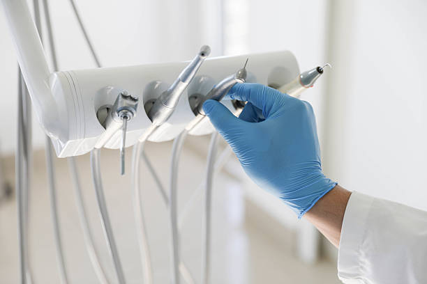 Professional Tooth Extraction technician working in Wesson, MS